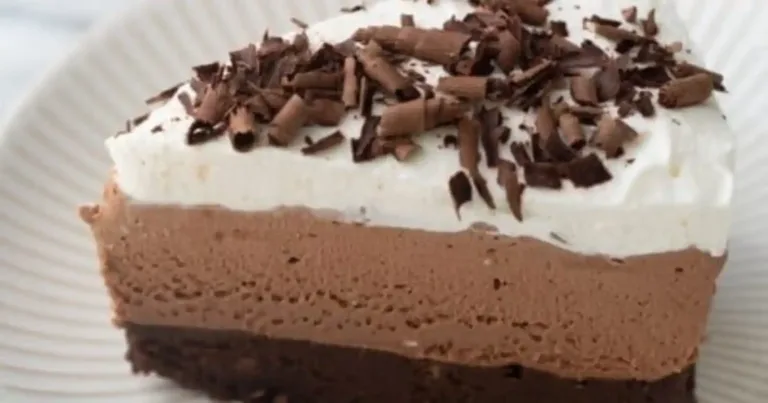 Delicious gluten-free chocolate mousse cake with rich chocolate topping