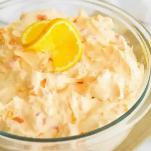 Mandarin Orange Jello Salad 2 Delicious Mandarin Orange Jello Salad served in a bowl