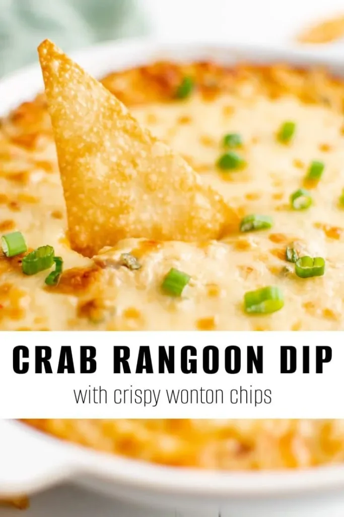 Creamy Crab Rangoon Dip served in a bowl with crispy crackers and herbs