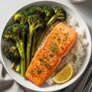 Air fryer salmon served with rice and roasted vegetables